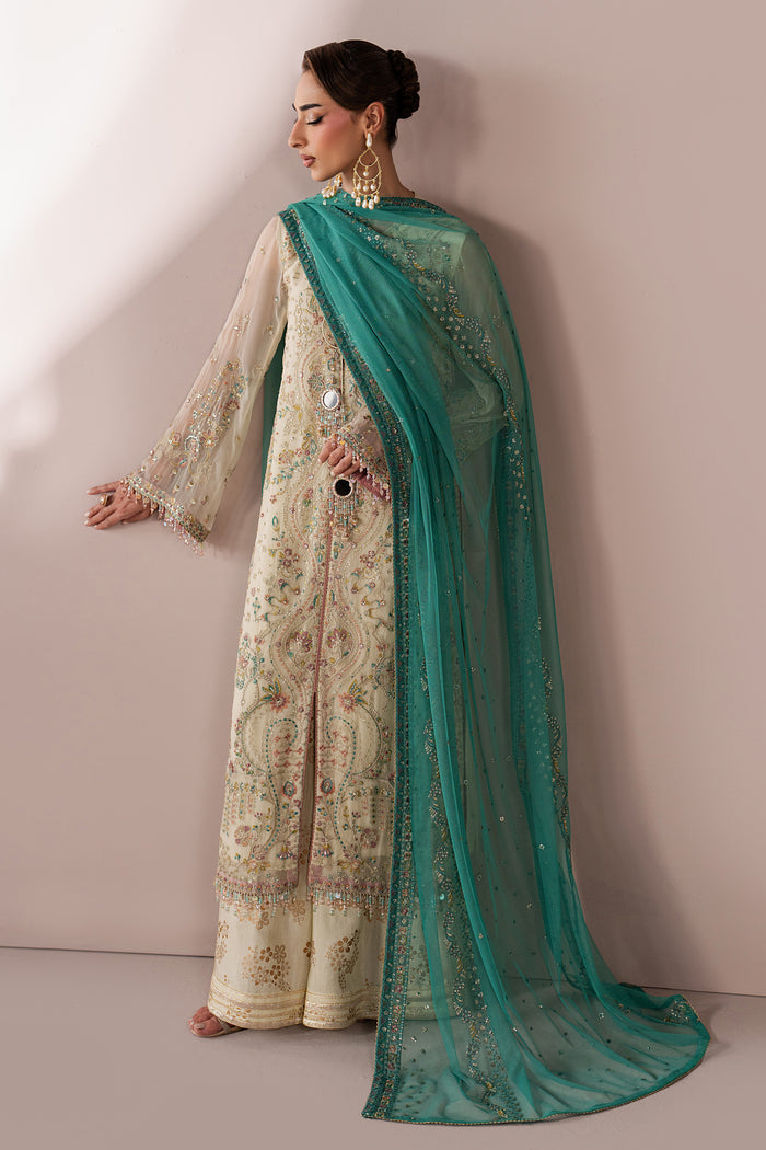 Back three-quarter view of Alanah showing the off-white embroidered open shirt and contrast teal Net dupatta with embroidered border.