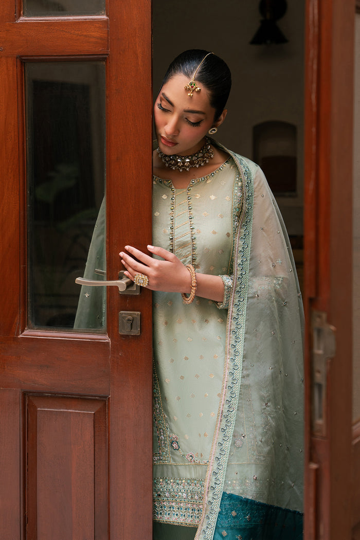 Close view of Amani aqua organza embroidered shirt with sequin work and organza brochia dupatta from NAQSHI festive collection