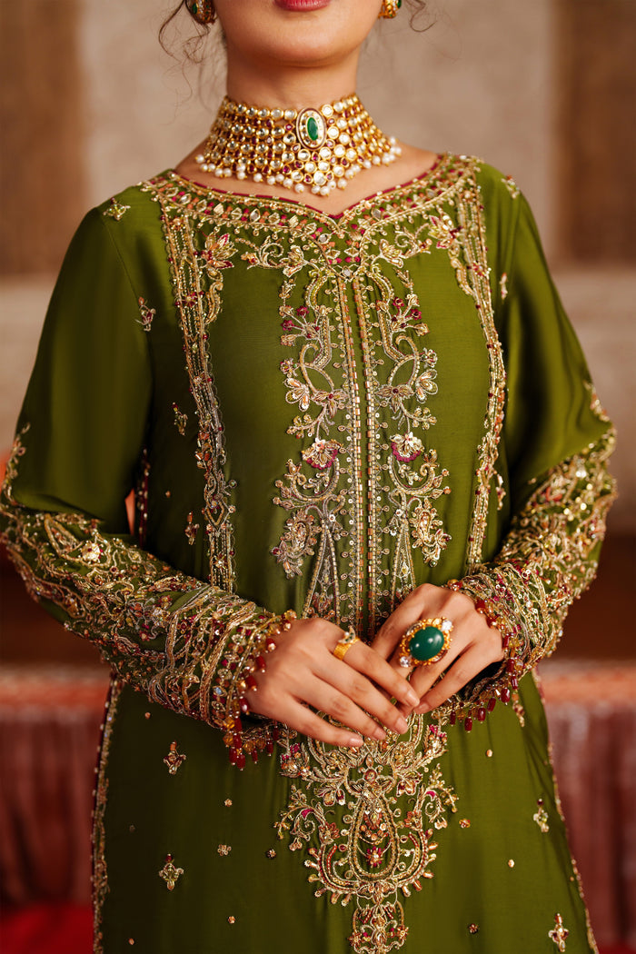Close up of NAQSHI Anadil fine embroidery and ornamentation on olive green ready-to-wear formal dress for special gatherings.