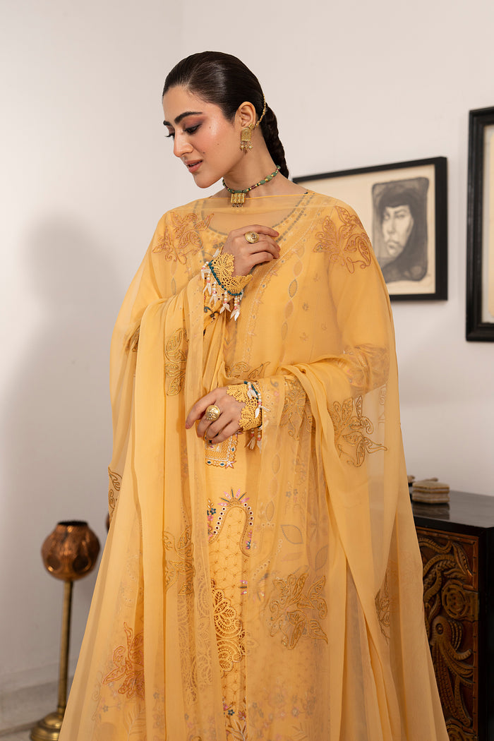 NAQSHI Anasia reddish orange casual pret outfit showcasing embroidered neckline, floral motifs and elegant Eastern summer styling