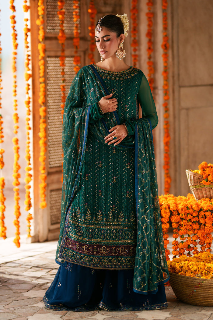 Close-up of Anfa embellished boat neckline with V detail, sequins work and decorative craftsmanship on green crinkle chiffon shirt