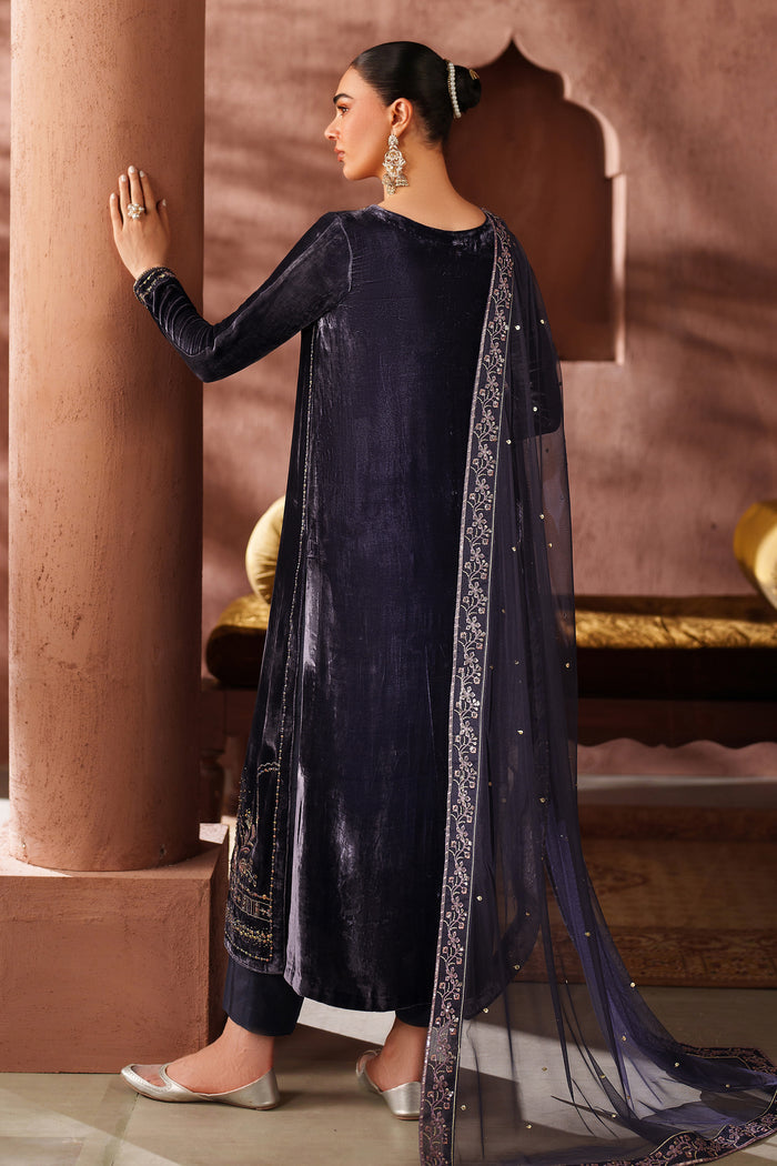 Back angled view of NAQSHI navy blue formal outfit highlighting clean silhouette and polished ready-to-wear finish