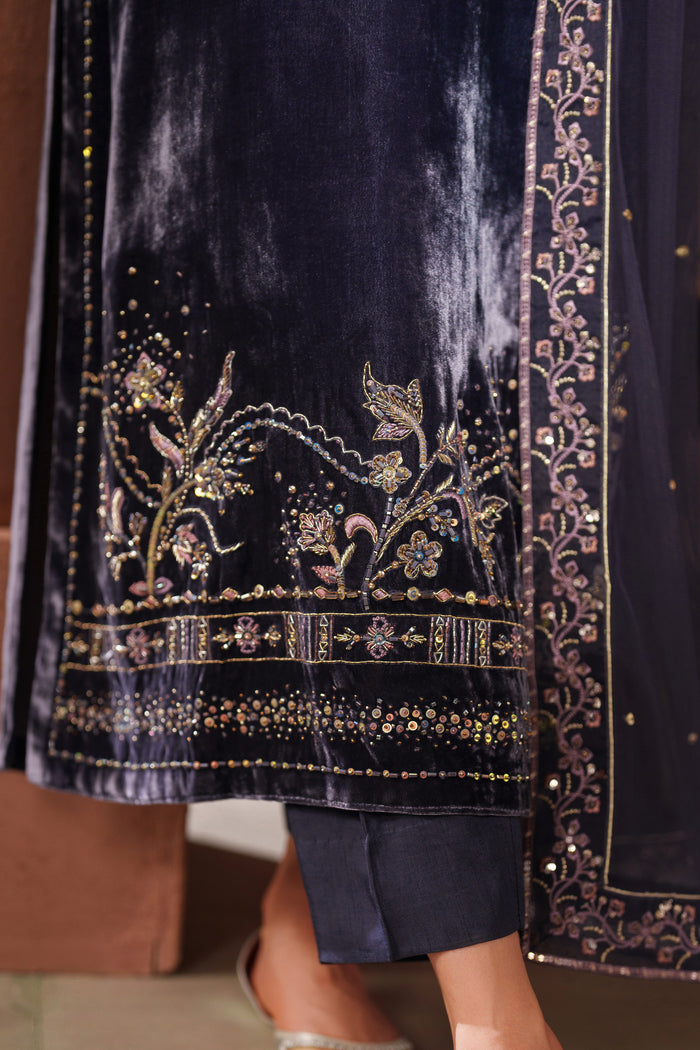 Close-up of NAQSHI navy blue shirt hem featuring detailed embroidery and fine craftsmanship for premium formal wear