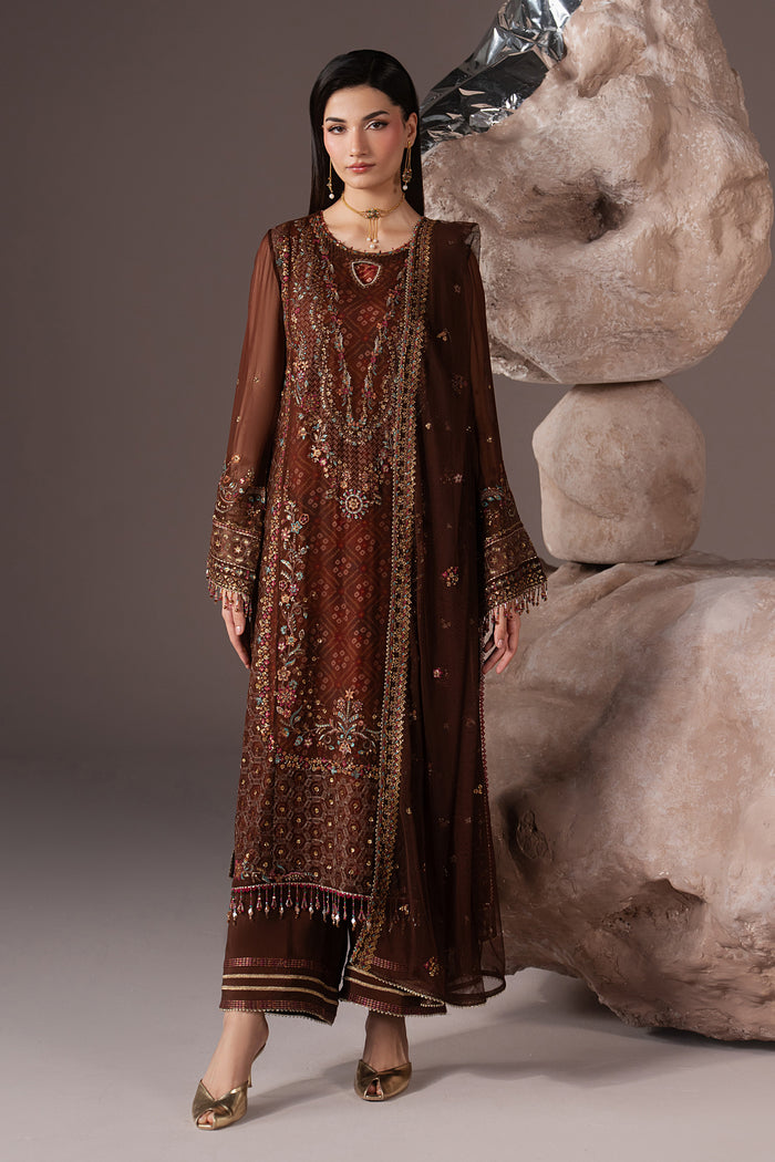 Aroob chocolate brown 3-piece semi-formal outfit with embroidered Crinkle shirt, PK Raw Silk culotte and Net dupatta in a full front view.