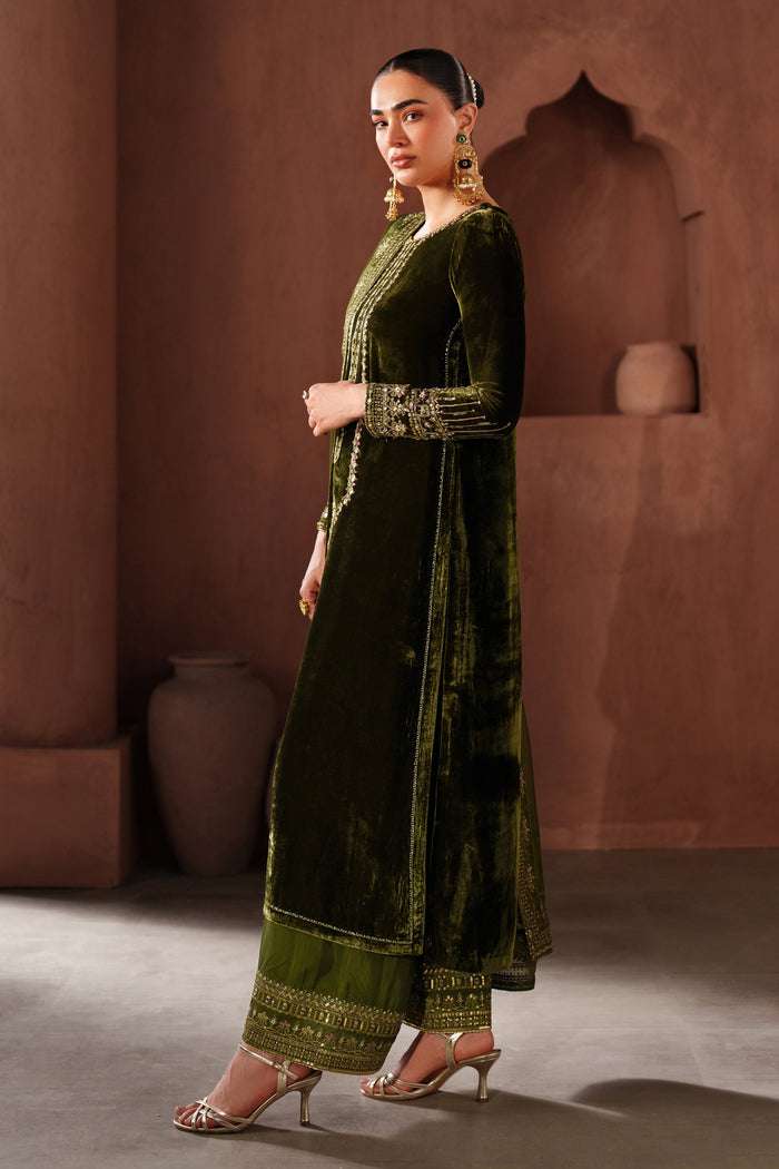 Front full-length view of NAQSHI dark green formal stitched outfit showing straight embroidered shirt and coordinated trousers.