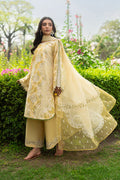 Ashfi yellow lawn 3 piece ready to wear outfit with white thread embroidery, flared cambric trouser and cotton organza dupatta for summer daytime events.