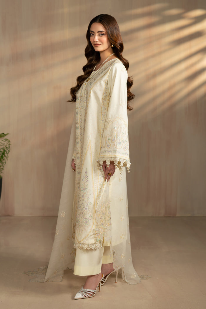 Side view of Ashnoor outfit showing modest straight silhouette and soft organza dupatta fall, stitched summer eastern wear.