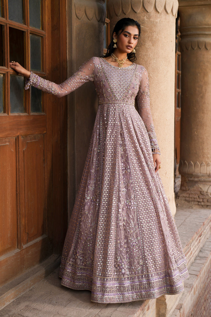 Blaithin tea pink evening maxi in motion highlighting wide embroidered flare and full sleeves.
