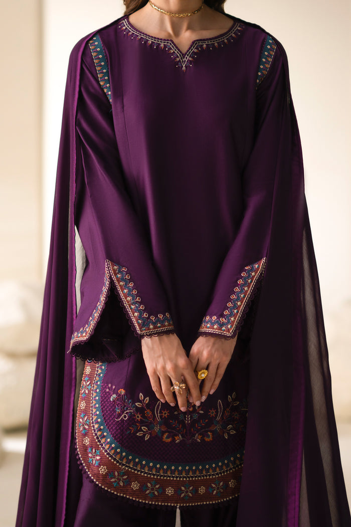 Close front view of Cecily Mulberry shirt showing embroidered neckline, sleeve cuffs and curved lower detailing.