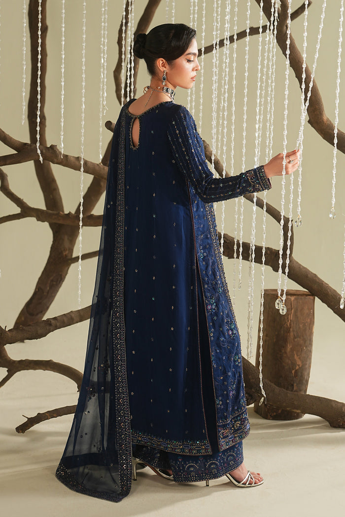 Royal blue long straight shirt side view with culotte and crinkle dupatta, soft flowy formal outfit for evening and festive occasions.