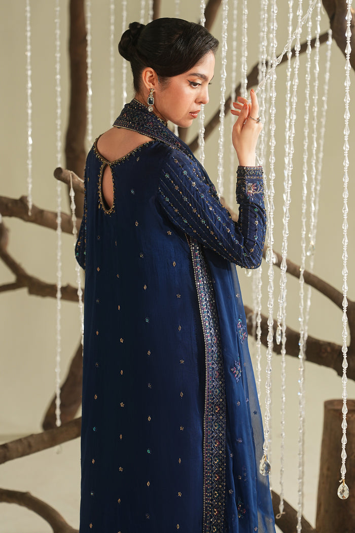 Royal blue formal ready-to-wear outfit with long straight shirt, culotte, and dupatta, back side pose showing full elegant styling.