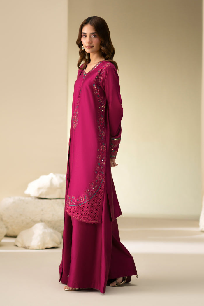 Side view of Easten Shocking Pink Cotton Sateen shirt with wide culotte and fitted sleeves.