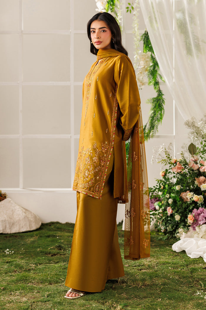 Side angle view of NAQSHI Eda outfit highlighting clean cotton satin shirt cut and relaxed culotte trousers