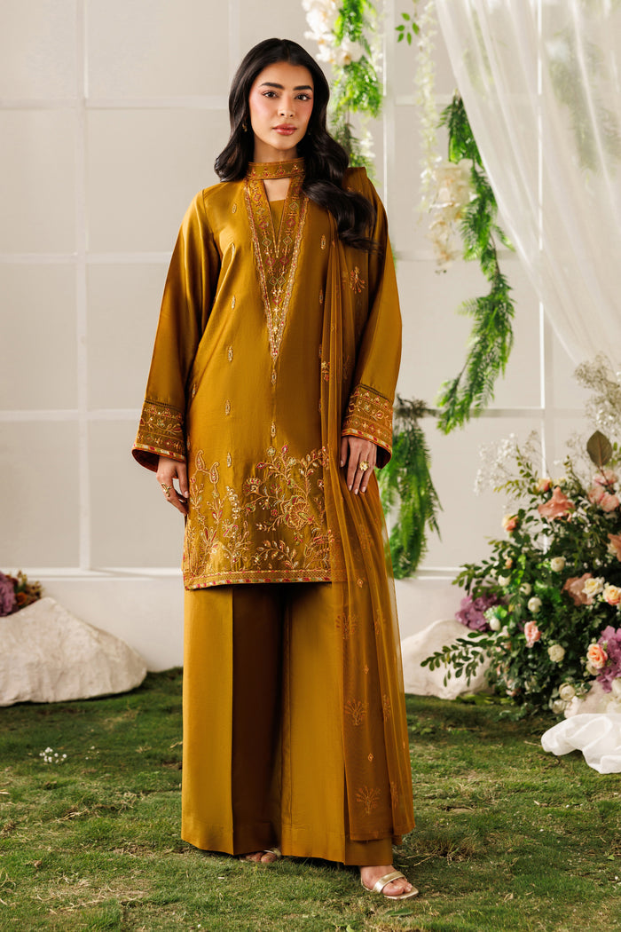 Full front pose of NAQSHI Eda outfit highlighting machine embroidery, printed facing details, and neat casual look