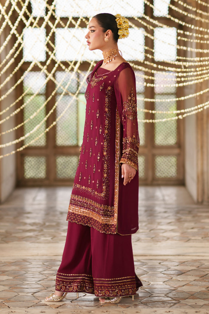 Side view of Ehaad plum crinkle semi formal outfit featuring embellished borders, flowing dupatta and festive Eastern wear styling