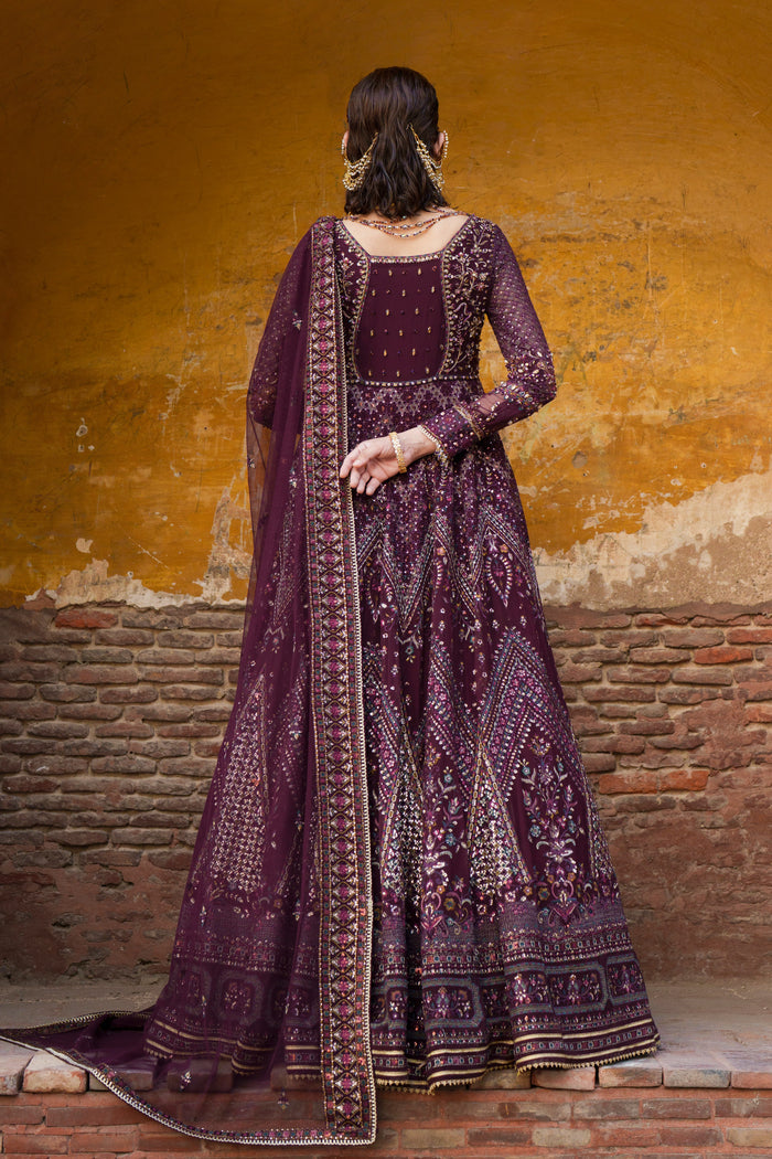 Emma plum evening maxi back view showing deep neckline, hanging detail and embroidered panels.