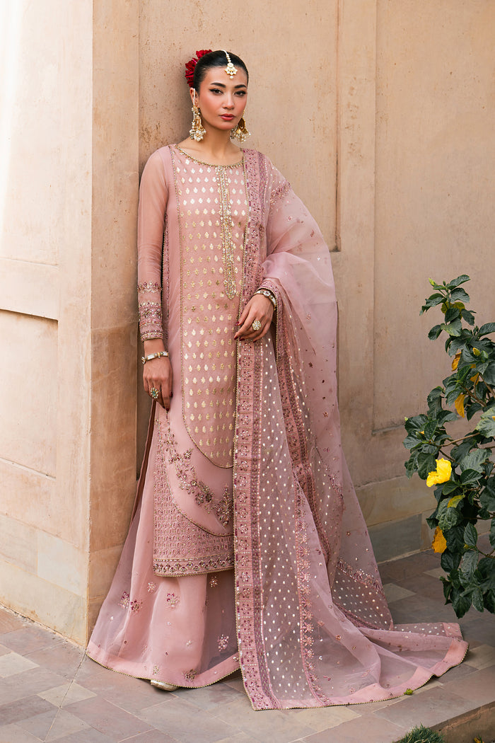 Faris peach organza festive outfit with embroidered long shirt, flared trousers and matching organza dupatta