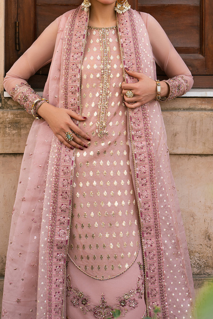 Close view of Faris peach organza embroidered shirt with brocia center panel, sequin work and curved embroidered hem