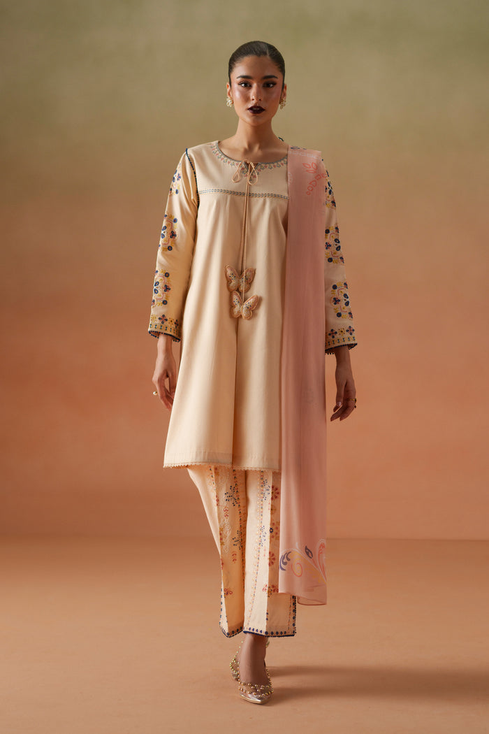 Faye light peach 3-piece ready-to-wear outfit with embroidered lawn shirt, cambric culotte trouser, and printed crinkle chiffon dupatta.
