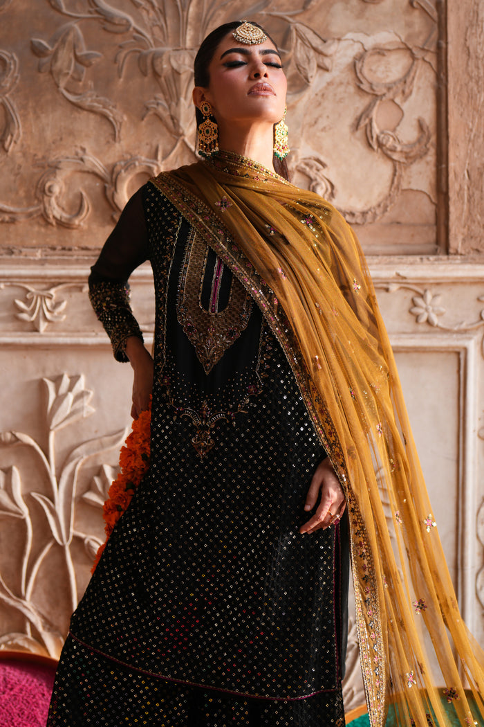 Irra ready to wear black semi formal outfit with statement neckline, festive embellishments and elegant brown net dupatta