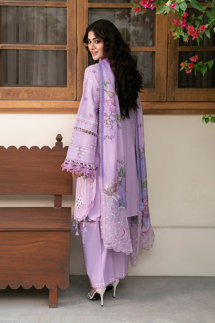 Side view of Izna lilac embroidered lawn suit featuring floral embroidery, relaxed silhouette and tissue silk printed dupatta for summer wear