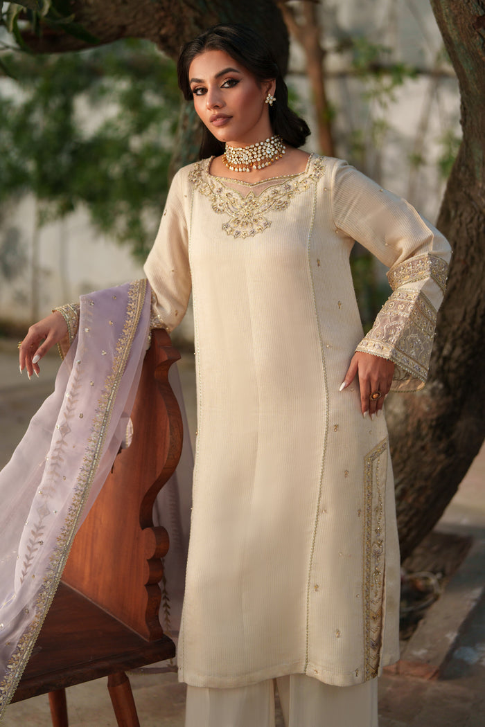 NAQSHI Kai front shot: raw silk culottes with pleated detail and luxurious texture