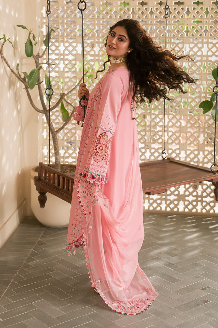 Side view of NAQSHI Kashmeera soft pink embroidered lawn outfit showcasing flowy silhouette and lightweight crinkle dupatta for summer wear