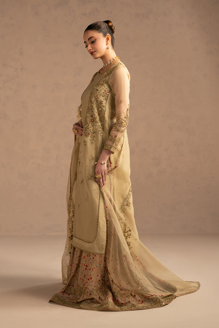 Back angled view showing movement of organza layer and structured panels, formal event ready attire.