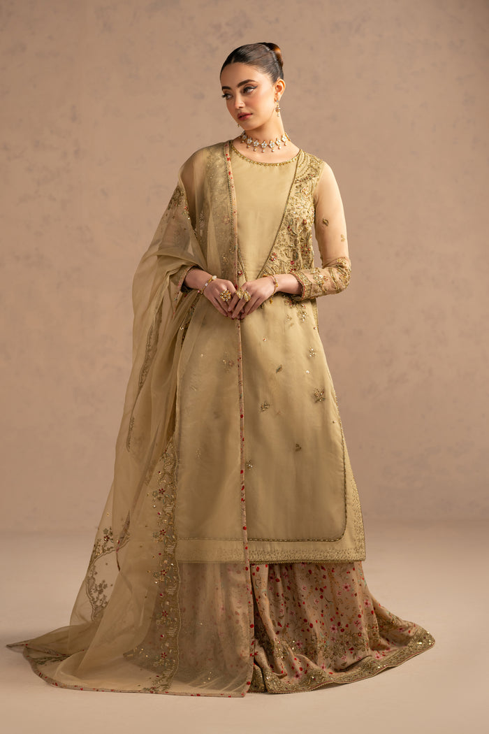 Full view showing balanced proportions of long shirt and wide sharara flare, suitable for nikkah and engagement gatherings.