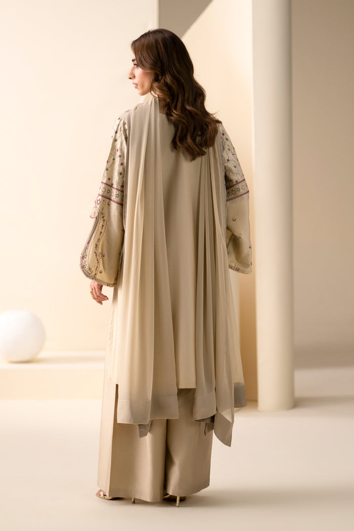 Back view of Louisa Dusty Beige Cotton Sateen shirt with culotte and flowing Crinkle dupatta.