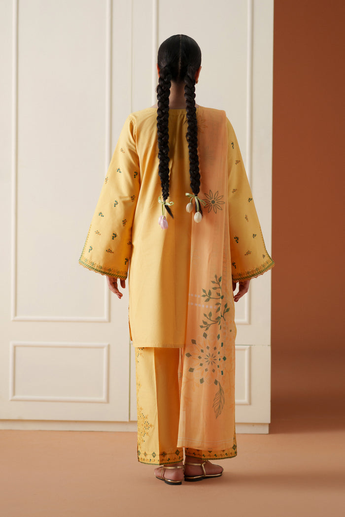 Back view of Mabel yellow ready-to-wear dress showing loose lawn shirt, printed crinkle chiffon dupatta, and culotte trouser.