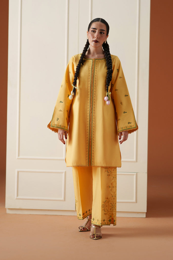 Front pose of Mabel yellow 3-piece casual pret outfit with embroidered lawn shirt, culotte trouser, and soft printed dupatta.