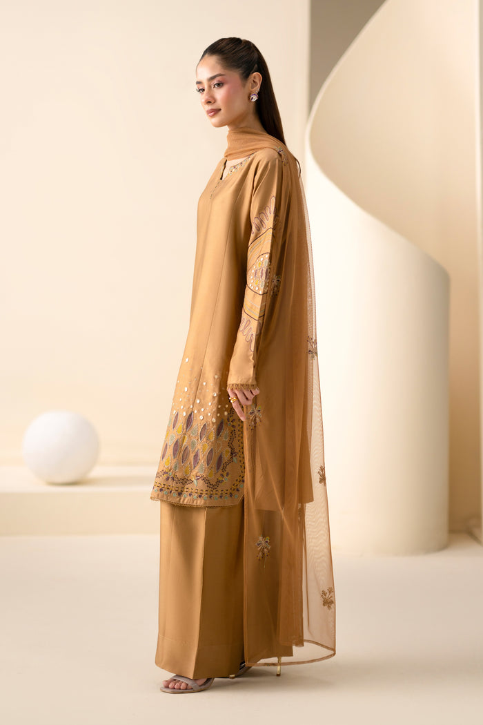 Side view of Maddox Golden Brown embroidered shirt with Cotton Sateen shalwar and Net dupatta.