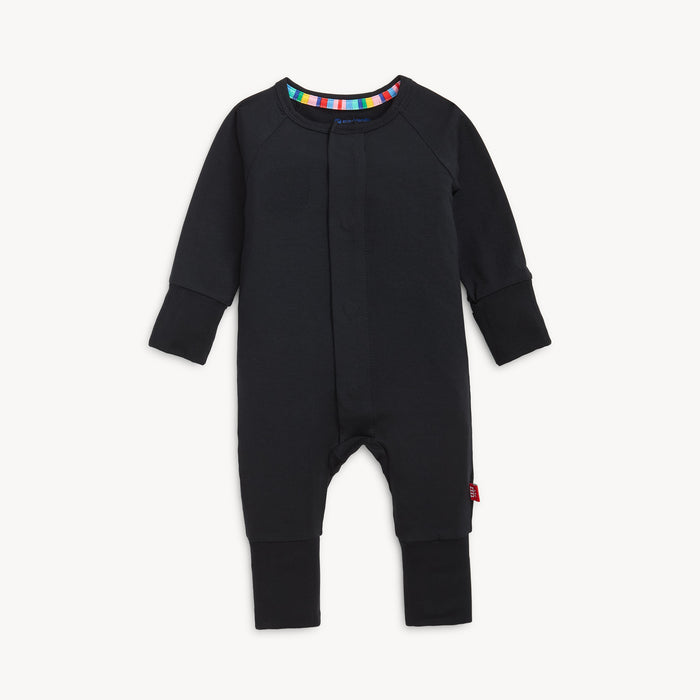 A solid black long-sleeve convertible coverall romper with a hidden magnetic closure by Magnetic Me.