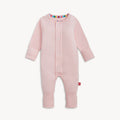 A solid light pink long-sleeve convertible coverall romper with a hidden magnetic closure by Magnetic Me.