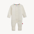 A solid off white long-sleeve convertible coverall romper with a hidden magnetic closure by Magnetic Me.