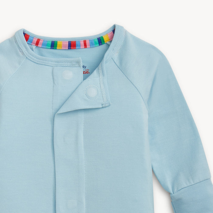 Open magnet in the center of A solid baby blue long-sleeve convertible coverall romper with a hidden magnetic closure by Magnetic Me.