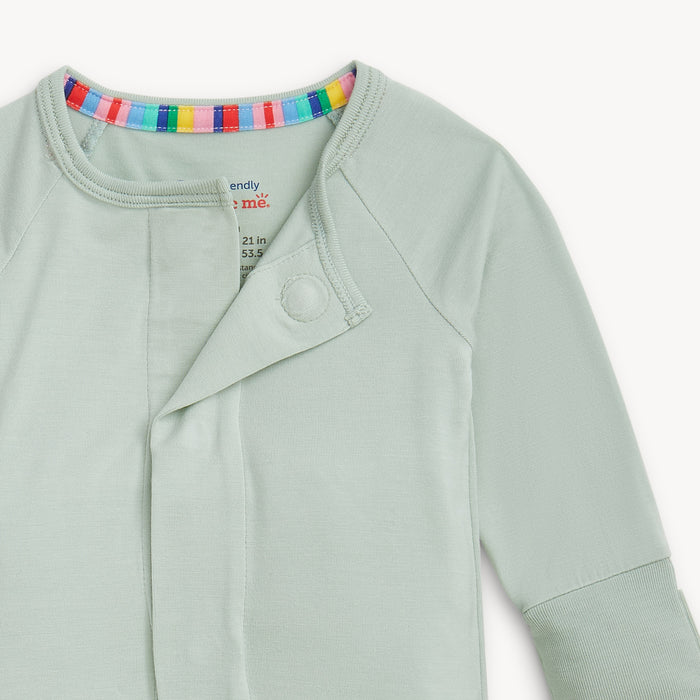 Open magnet in the center of A solid seafoam green long-sleeve convertible coverall romper with a hidden magnetic closure by Magnetic Me.