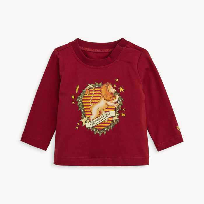 A burgundy long-sleeve t-shirt with hidden shoulder magnets featuring a Gryffindor house crest print with a lion and gold stars, by Magnetic Me for Warner Brothers.