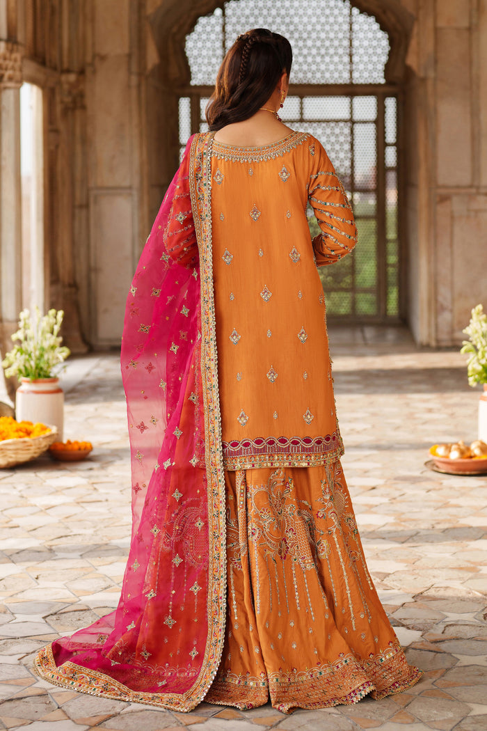Back view of NAQSHI Mahzaeeb orange formal outfit with full embroidery and pink net dupatta drape for special occasion wear.