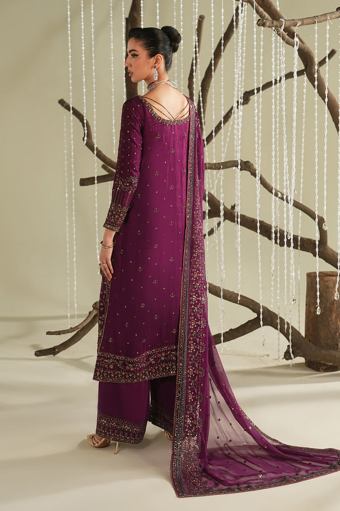 Deep plum long flared shirt side view with culotte and crinkle dupatta, soft flowy formal outfit for festive and special occasions.