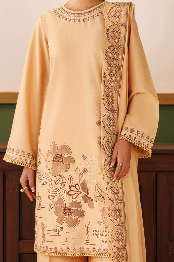 Close-up of NAQSHI Melia cambric shirt showing floral embroidery with organza patches and light sequence work