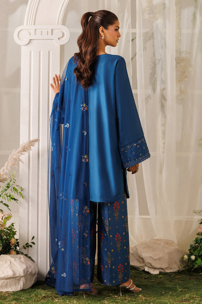 Back standing view of NAQSHI Mihha outfit showing relaxed shirt fall, loose sleeves, and printed culottes