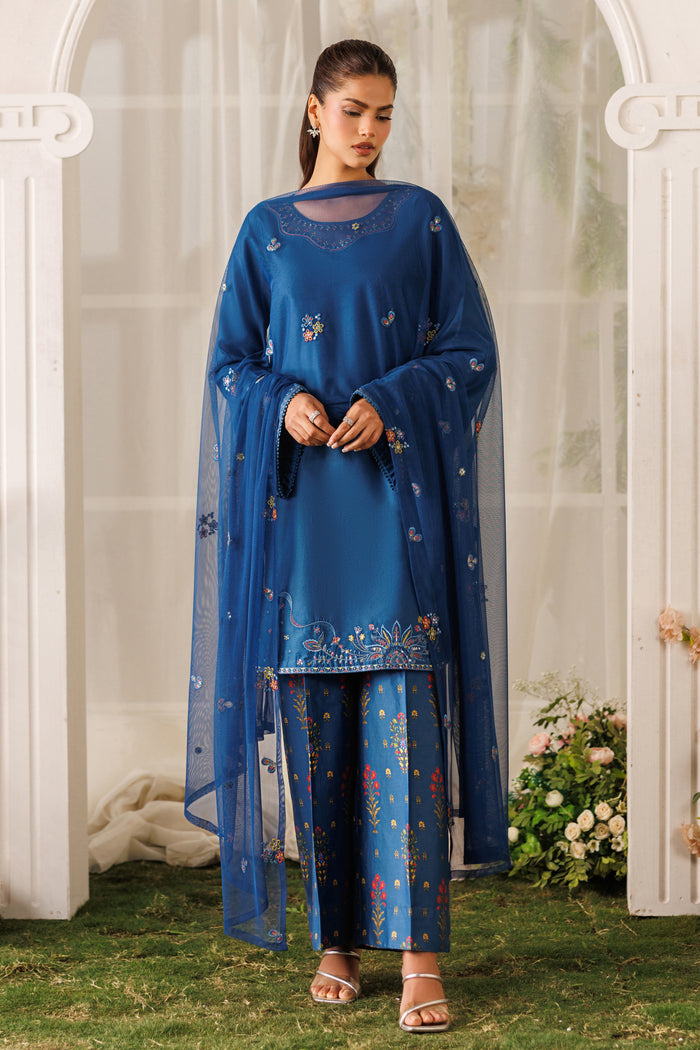 Full front standing view of NAQSHI Mihha outfit showing deep blue shirt, wide sleeve borders, and balanced fit
