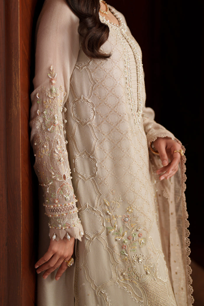 Detailed sleeve view of Minera embroidered khadi net shirt featuring intricate embroidery, cutwork finishing and decorative handcrafted details