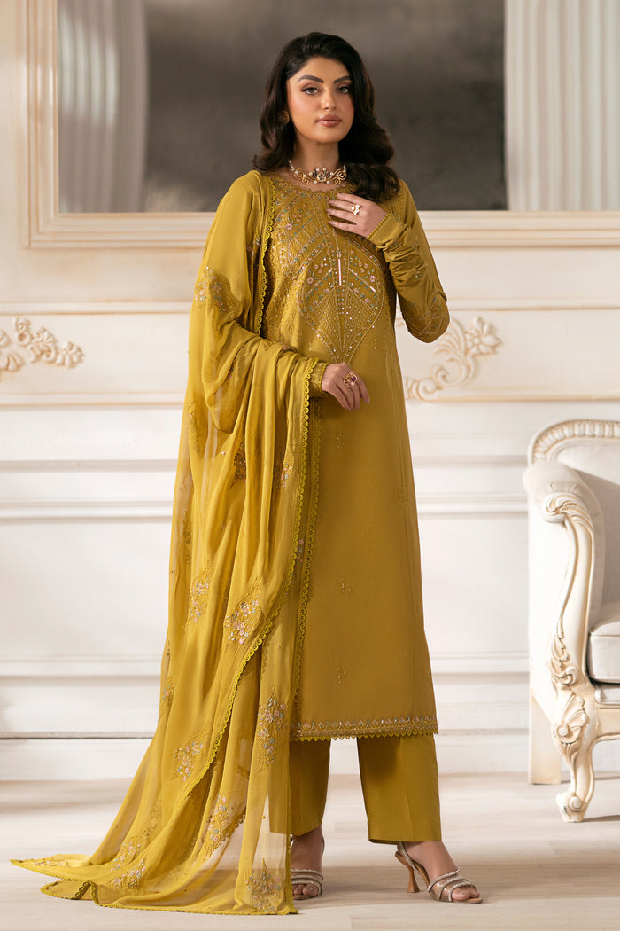 NAQSHI Nageena mustard cambric straight‑cut shirt featuring a round embroidered neckline, lace‑finished hem, and coordinating straight pants