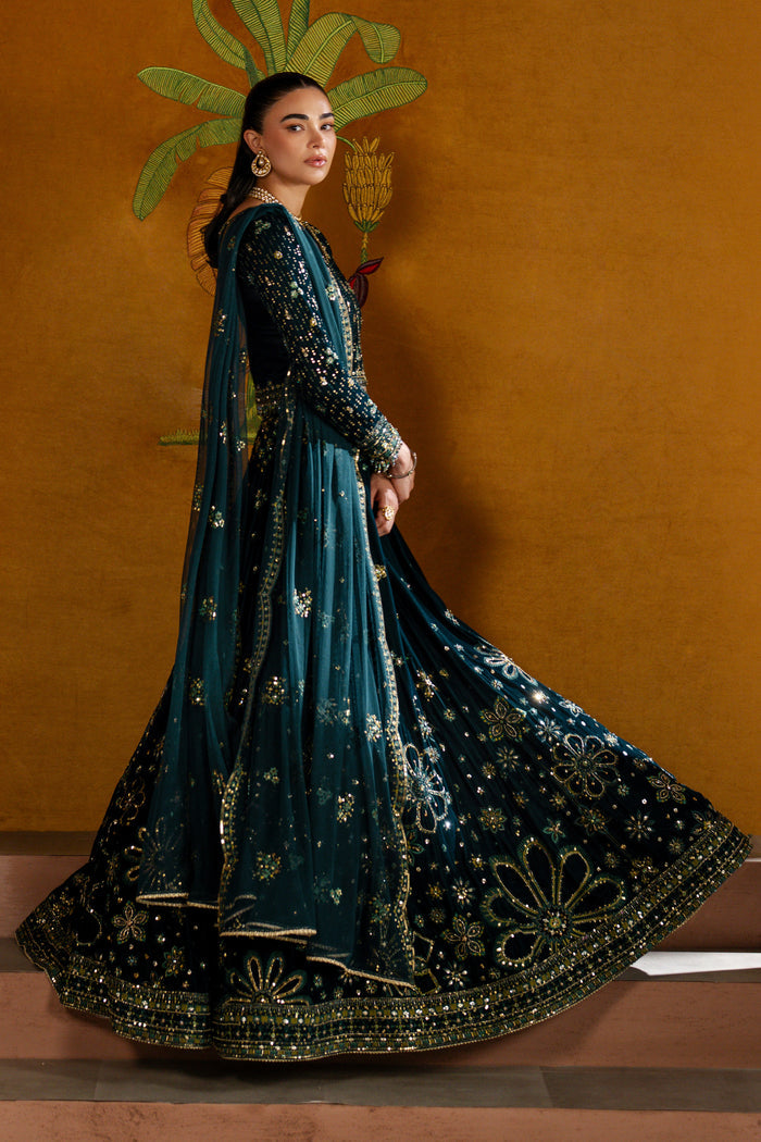Model in Narmeen zinc velvet lehenga spinning to show full embroidered skirt and flowing dupatta — premium ready-to-wear party outfit