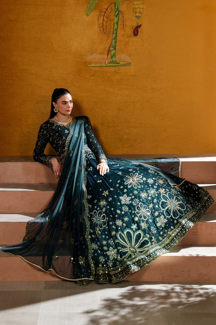 Portrait of model wearing Narmeen zinc velvet lehenga with gold thread details and embellished bodice — elegant women’s festive outfit