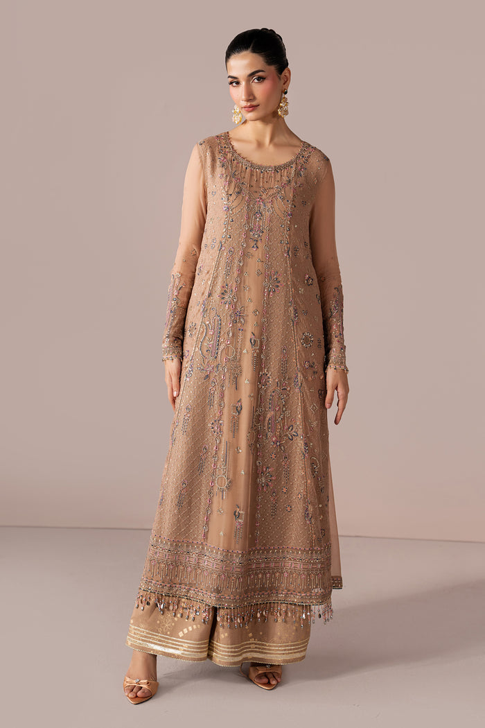 Full-length front view of Navira showing the peach embroidered shirt, PK Raw Silk flared pants and coordinated contrast dupatta.
