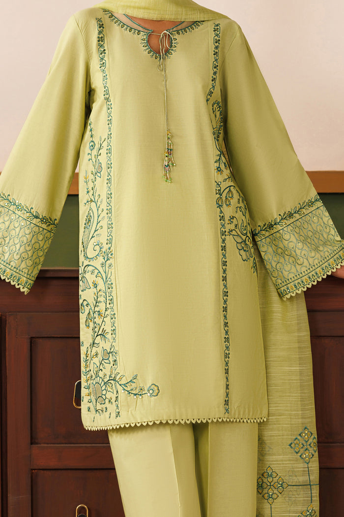 Close-up of NAQSHI cambric shirt showing organza layered neckline, tassel detail, and light embroidery finish
